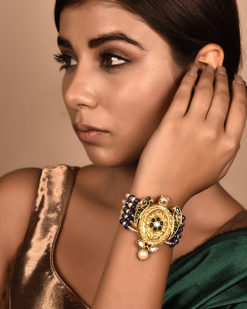 TWIN BIRD PAUNCHI IN GOLD