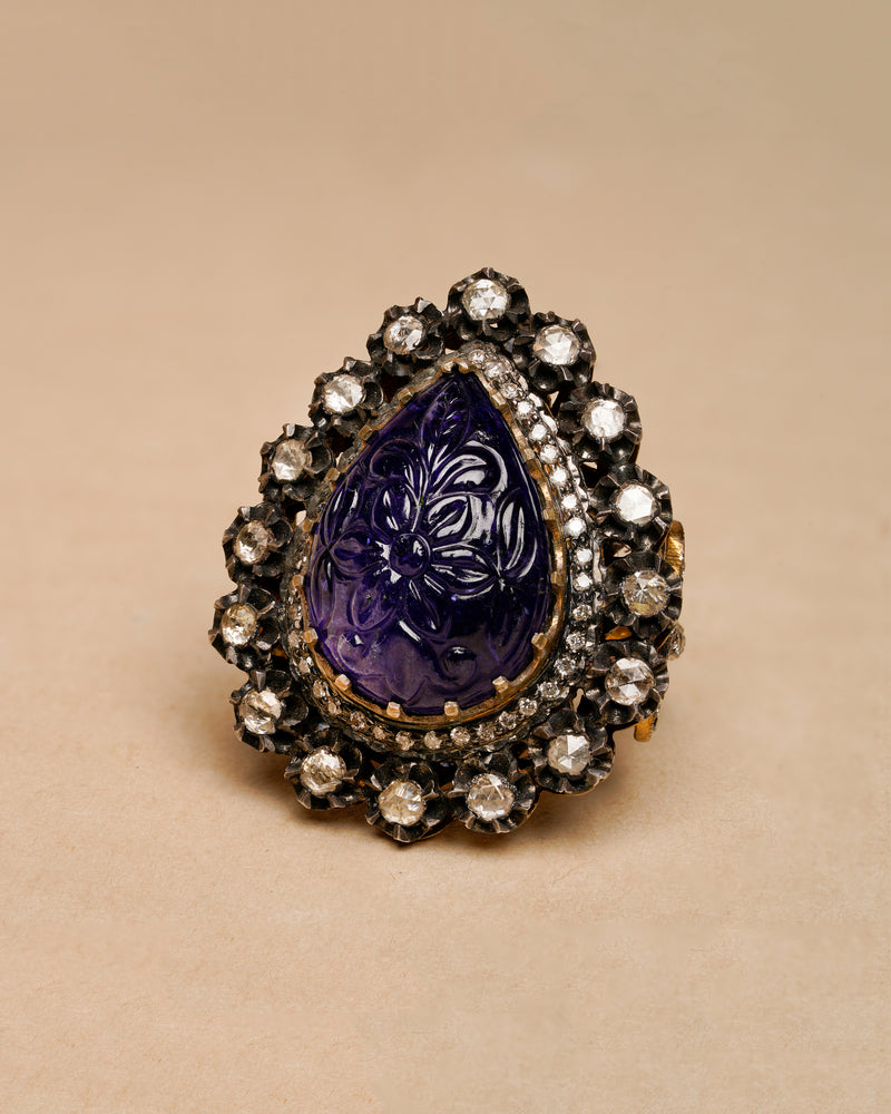 DEEP BLUE CARVED TANZANITE RING WITH ROSECUT DIAMONDS