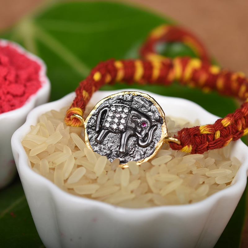 SYMETREE HASTI CHARM RAKHI BRACELET